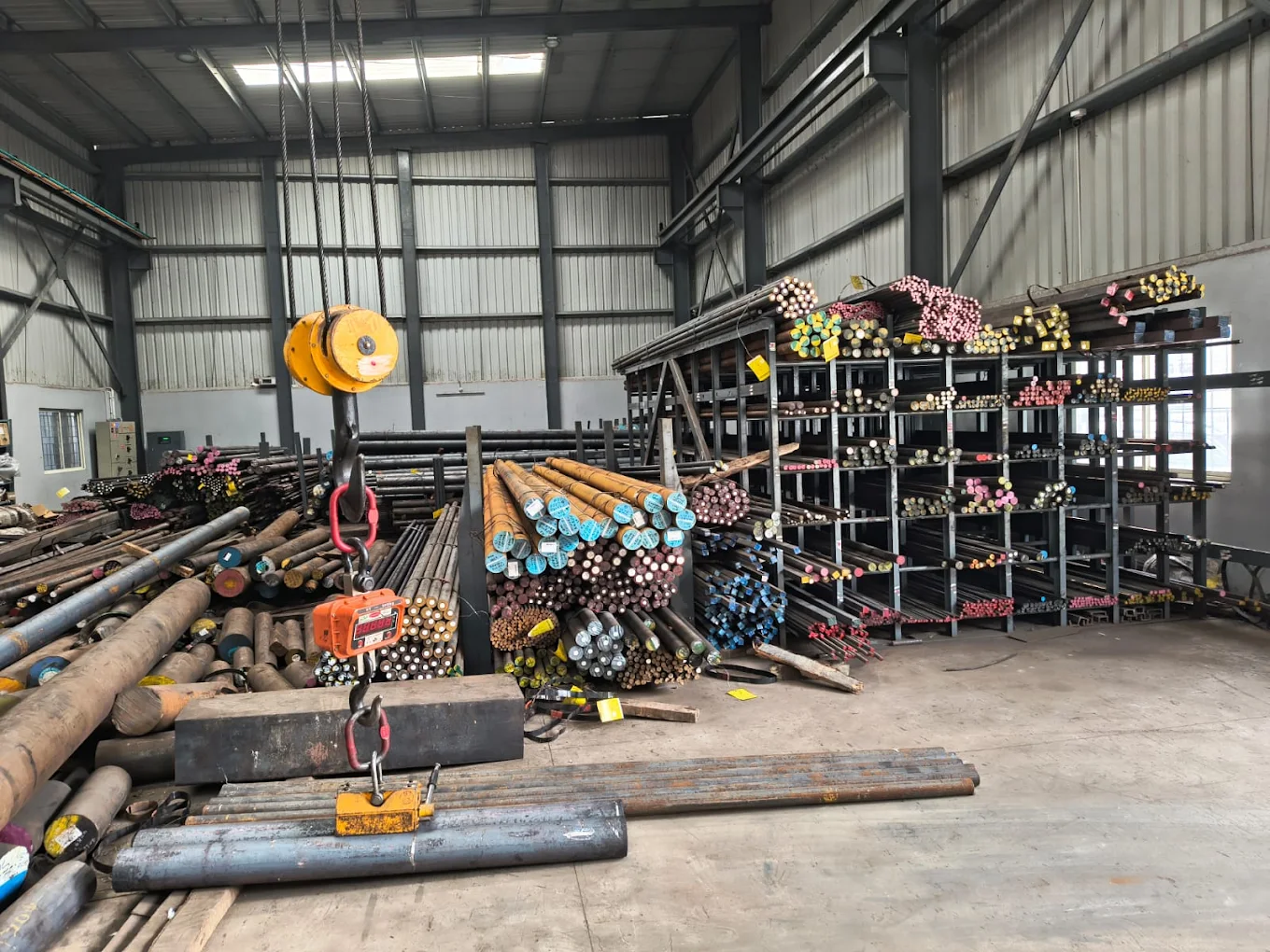 Warehouse with crane and steel bars