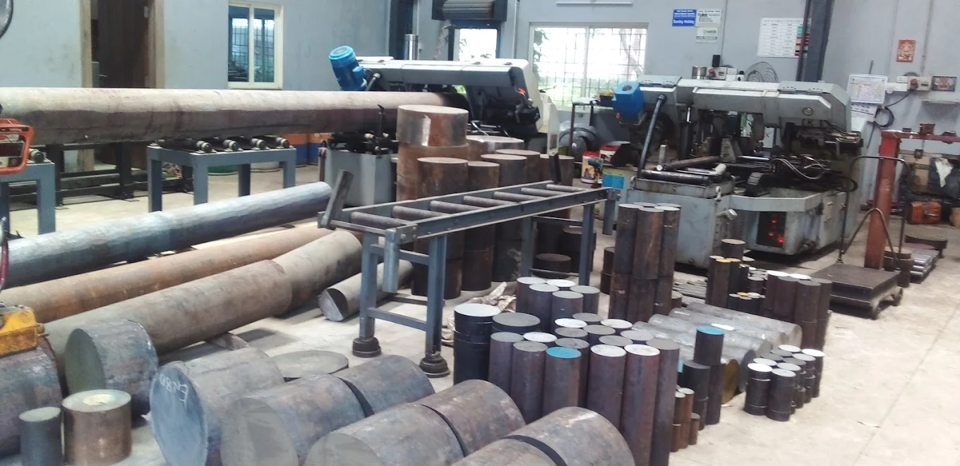 Workshop floor with cutting machines and steel products